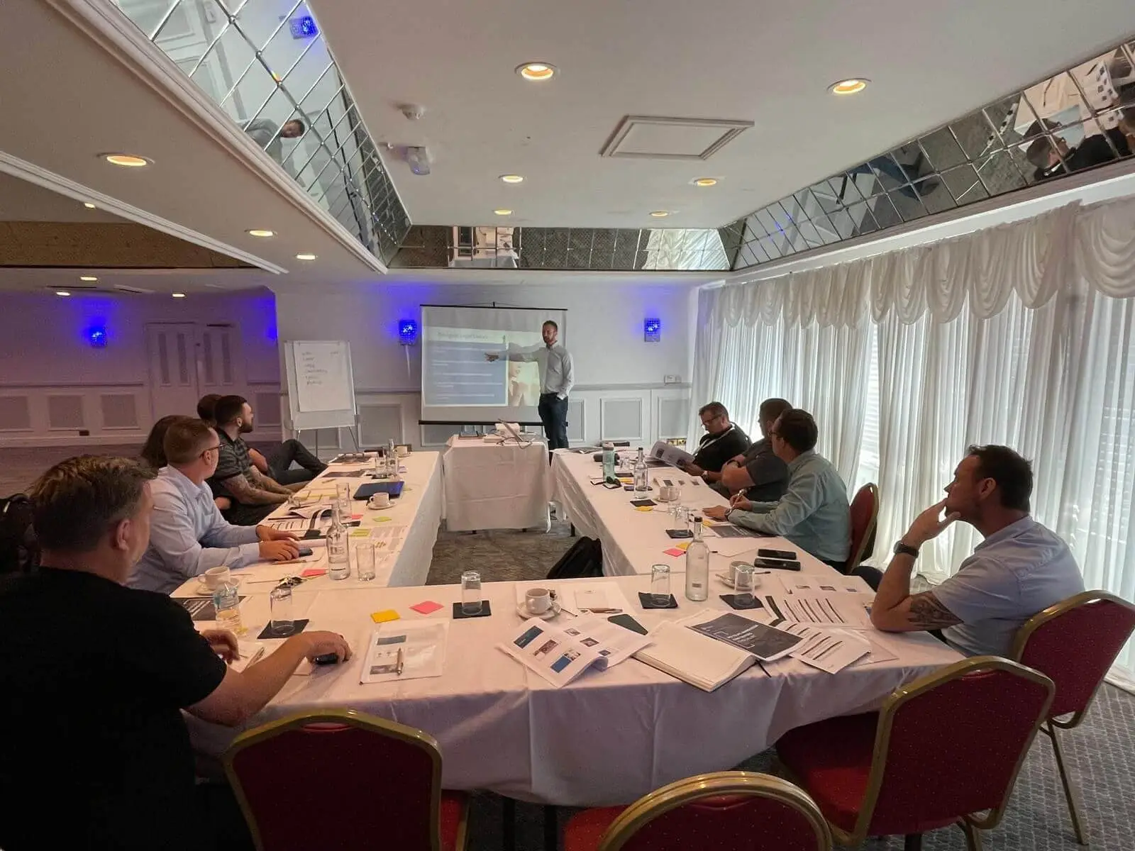 A presenter leading a CDM for Telecoms workshop session